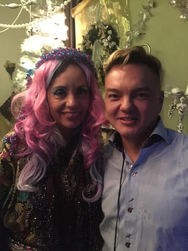 Diana Tenes in festive attire at a private holiday celebration in San Francisco.
